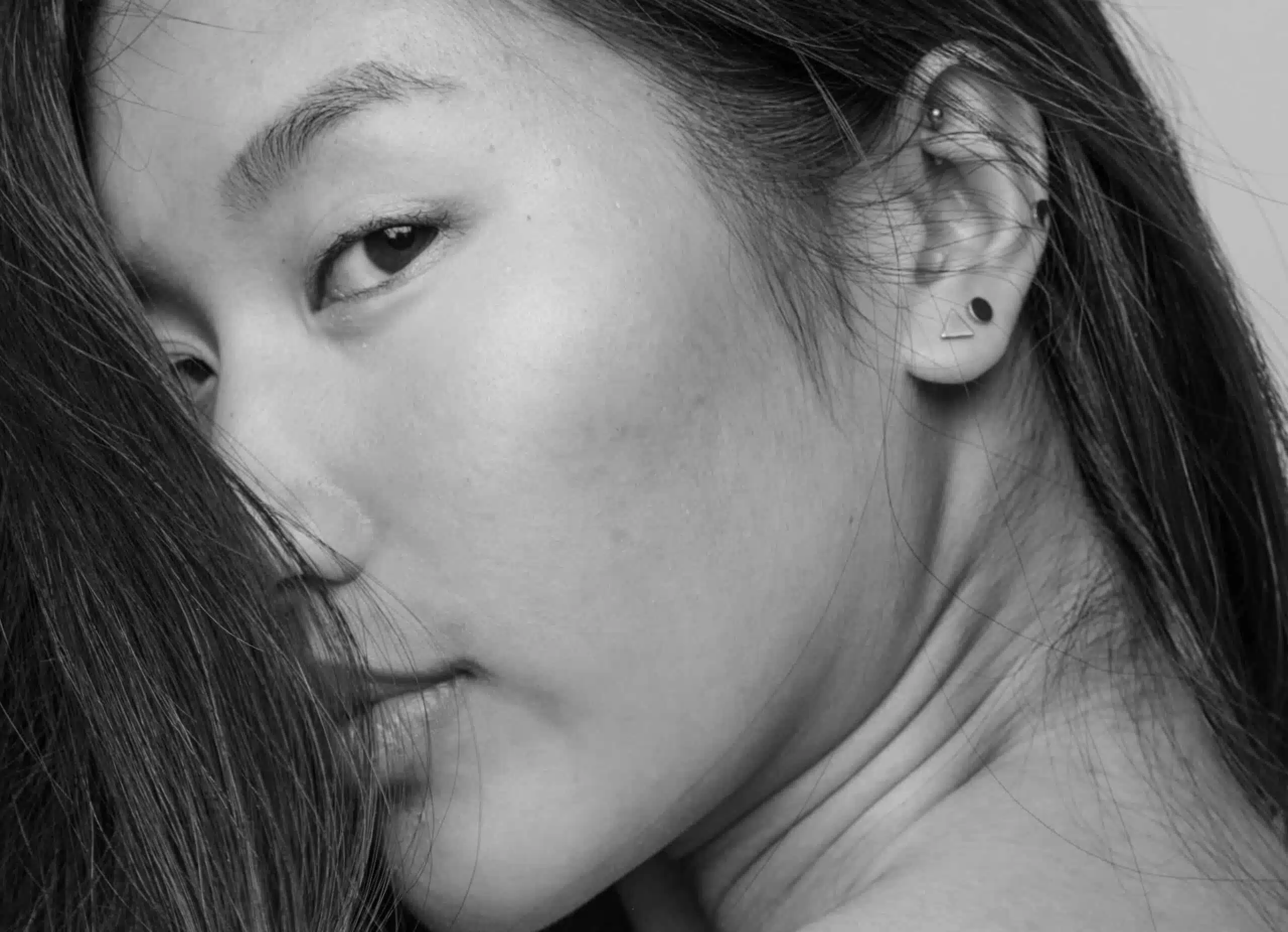 Jolie Photo du visage d une femme asiatique - lifting temporal | Dr Santini Paris 16